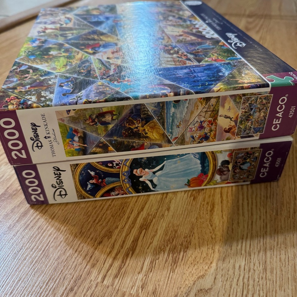Bundle of 2 Disney 2000 Piece Jigsaw Puzzles by Ceaco